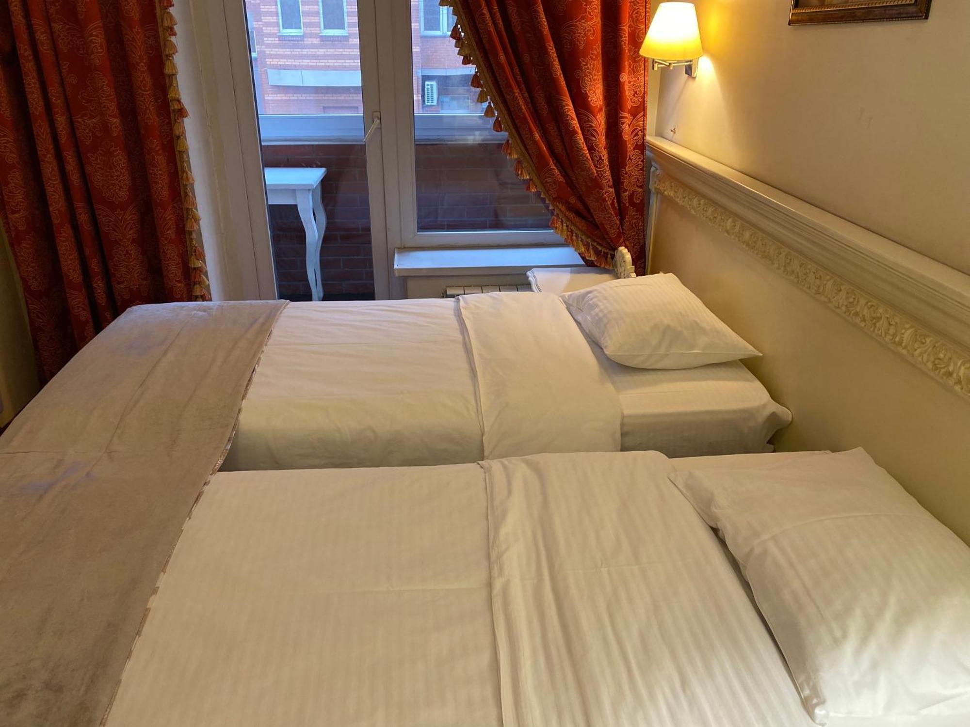 Royal City Hotel Kiev Habitación foto